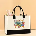 Bolso tote de lona en crema y negro con un colorido estampado para profesores - 43*13.5*30.5cm / Estilo Ilustración Vida de Maestro (Teacher-13)