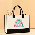 Large canvas tote bag featuring MAMA rainbow print with black contrast handles and base - 43*13.5*30.5cm / Mama Rainbow Heart (Mother-5)