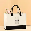 Stylish canvas tote bag featuring repeated MOM print with elegant black trim and handles - 43*13.5*30.5cm / MOM Letter Pattern Printed (Mother-52)