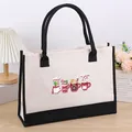 Large cream canvas tote bag with black trim featuring festive coffee mug prints - 43*13.5*30.5 / Christmas 16 (Coffee Cup Pattern)