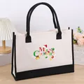 Large capacity canvas tote bag featuring a festive Merry Christmas print and black trim - 43*13.5*30.5 / Christmas 18 (Merry Christmas Art Word)