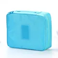 Bolsa de aseo de viaje azul claro portátil e impermeable con gran capacidad - Azul claro