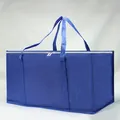Detailed view of a large blue waterproof PE moving bag with long handles and zipper closure - Blue
