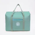 Large mint green travel duffel bag with lightweight waterproof material and airplane logo - Round Label Gen 2 / Sky Blue