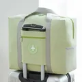 Large capacity foldable waterproof travel duffel bag in mint green with suitcase sleeve - Round Logo Bag / Green