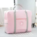 Large pink foldable travel bag made of waterproof fabric for luggage and clothes storage - Round Logo Bag / Pink