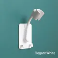 Wall-mounted adjustable punch-free shower head holder in elegant white finish - Strong Adhesive Backing / White