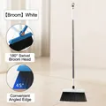 White long-handled broom with 180 degree rotating head and angled bristles for floor cleaning. - White Broom