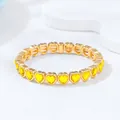 Elegant gold-tone link bracelet featuring vibrant yellow heart-shaped crystals for women. - Yellow Heart Link / Yellow (KC Gold)