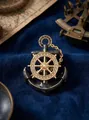 Exquisite vintage nautical gold anchor brooch with rhinestone wheel on blue velvet. - Anchor Shape / KC Gold