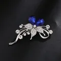 Elegant silver flower brooch with sparkling blue teardrop crystals and white rhinestones. - Blue Teardrop Flower Butterfly Style (XD11050-2)