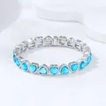Luxury silver-tone alloy stretch bracelet featuring vibrant sky blue heart crystals - Lake Blue (Palladium White K)