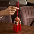 Exquisite traditional Chinese embroidered ball pendant featuring vibrant red tassels - Lanyard / Red