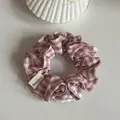 Detailed view of sweet pink and white gingham checkered scrunchie hair tie with label - Large Pink White Plaid Scrunchie / Pink