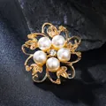 Elegant flower brooch featuring white pearls and gold-tone metal petals for blazers. - Gold Pearl Flower