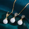 Parure de bijoux élégante en perles et zircons avec collier pendentif et boucles d'oreilles - Or champagne
