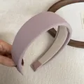 Close-up detail showing the soft ribbed fabric texture of a mauve padded headband - Wide Padded / Purple Ribbed Headband
