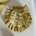Detailed view of a yellow checkered fabric scrunchie featuring a soft ruffled design - 1# Yellow Pleated Stripe Edge Hair Ring