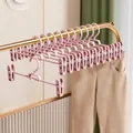 Pink non-slip pants hanger with adjustable clips for skirts and space-saving hook - Upgraded Thickened Silicone Style / Sakura Pink