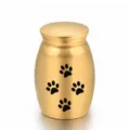 Elegante urna conmemorativa dorada para mascotas con diseño de huellas de patas - Dorado (25*16mm)