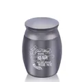 Detail of pet cremation urn with engraved wings and sentimental message - 30*40mm / Black