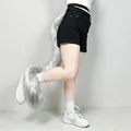 Long silver grey faux fur poseable cat tail cosplay prop wrapped around human leg - Gray