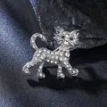 Detailed close-up of a sparkling rhinestone-encrusted cat brooch in silver alloy. - Silver Cat