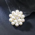 Close-up of elegant floral brooch with cream pearls and sparkling crystal center - Pearl Floral Style (XD825298-1) / Silver