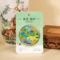 Close-up of Guilin Elephant Trunk Hill metal souvenir coin on display card - Guilin Commemorative Coin / Elephant Trunk Hill