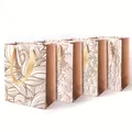 Elegante Papiertüten in Roségold mit Glitzer, Blattmuster und Satinbandgriffen - Sortiertes Stilset