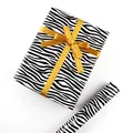 Cadeaupapier op rol met zebraprint en een elegante gouden decoratieve strik voor pakjes - Zebrapatroon (6030431920461) / 50x70cm