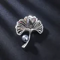 Vintage ginkgo leaf brooch with grey crystal and pearl on elegant black silk background - Ginkgo Leaf Shape / Antique Silver, Gray
