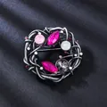 Vintage Kristall-Brosche in Magenta und Grau für elegante Anzüge und Abendkleider. - Rund Rosarot