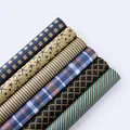 Sortiment an Retro-Kraftpapierrollen mit nautischen, karierten und gestreiften Mustern - Set 1 / 6er-Set Rollen