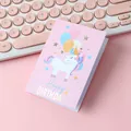 Cute pink folding birthday greeting card with a colorful cartoon unicorn and balloons - Pegasus Balloons