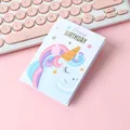 Cute unicorn happy birthday folding greeting card with pink keyboard background - Pegasus