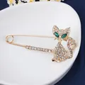 Vintage gold cat safety pin brooch with sparkling green rhinestone eyes and crystals. - KC Gold Green Eyes
