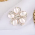 Elegant vintage gold-tone flower brooch featuring five pearls and pavé rhinestones - KC Gold, White Rhinestone + Beige Pearl