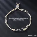 Detailed view of the adjustable infinity symbol bracelet with shiny zircon stone inlay - Infinity Symbol Style (SL217-2) / Off White