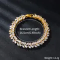 Detailed macro view of a gold leaf-shaped zircon bracelet showing size and weight. - Pave Marquise Floral Style (SL315-2)