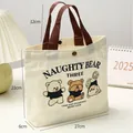 Small canvas bento bag with cute naughty bear print and brown handles, 27x21cm - Top Handle Bag / Three Posing Bears