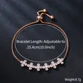 Close-up of adjustable rose gold bracelet with flower-shaped cubic zirconia stones. - Five Flowers Style (SL352-3) / Rose Gold
