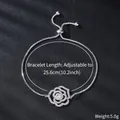 Detail view of an adjustable zircon rose flower bracelet with length and weight specs - Hollow Rose Style (SL189-1) / White Gold