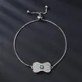 Elegant adjustable silver bracelet with micro-pave cubic zirconia evil eye charm design - Bone Shape Evil Eye Style (SL108-1) / Silver