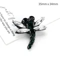 Broche libellule faite main avec strass verts et clairs sur base en tissu noir 35x34mm - Forme Libellule Effet Vert Foncé (XD8455)