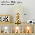 Gold table lamp with a pleated beige shade featuring touch control and three color modes. - Style B (Beige Pleated) / 3-Color Stepless Dimming Rechargeable