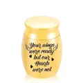 Small golden memorial cremation urn for pet ashes featuring heart and wing engravings - 40*30mm / Gold