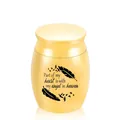 Golden mini cremation urn for human or pet ashes with feather engraving - Gold