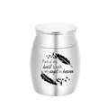 Engraved silver keepsake cremation urn for human or pet ashes with angel heart motif - Silver