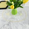 Detailed view of elegant ivory mesh placemat featuring embroidered ballet dancers and Je t'aime text - 30x45cm / Beige